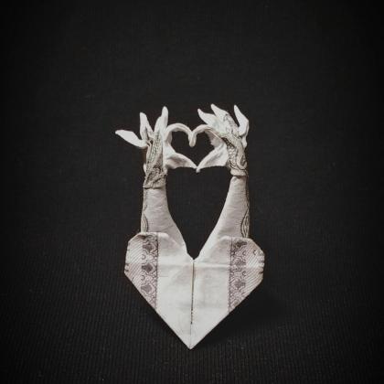 Money heart hand sign 