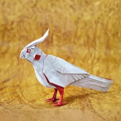 Lutino Cockatiel- Structurally, this model shares the same base I developed for my earlier origami parrot, derived from the classic bird base. The design focuses on form and proportion while keeping the shaping minimalistic.