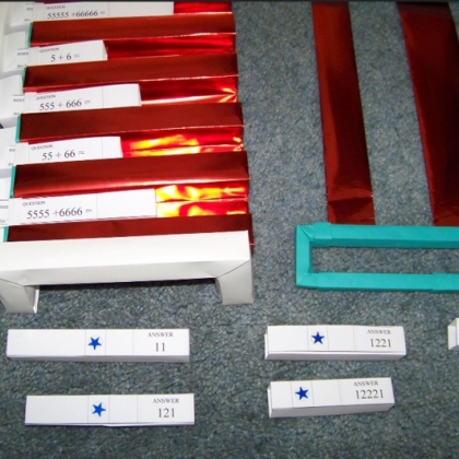 Here is the the model shown with the top frame removed so you can see how the question sticks are inserted.